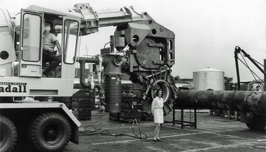 Women Next to Pipeline EB Welding System